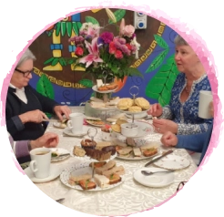 Group of women chat over afternoon tea